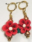 red polyclay flower stitch marker